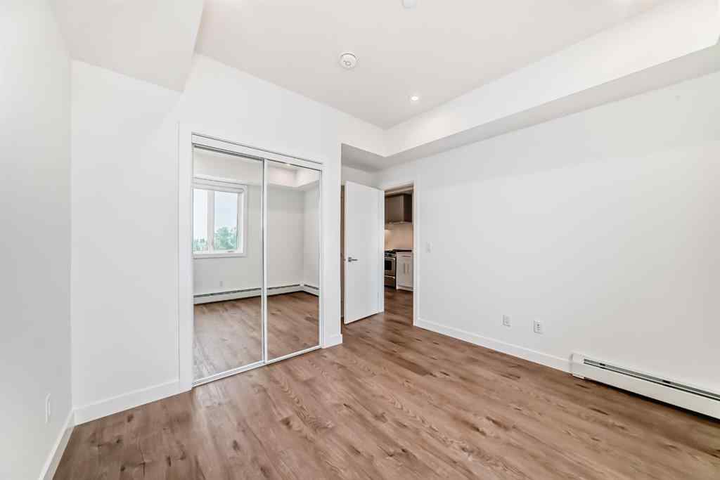 MLS® A2233786 - Unit #411 8230 Broadcast Avenue SW in West Springs Calgary, Residential