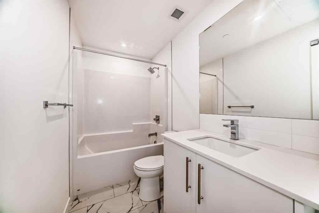 MLS® A2233786 - Unit #411 8230 Broadcast Avenue SW in West Springs Calgary, Residential
