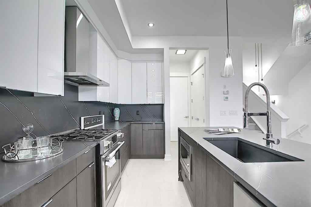 MLS® A2233804 - Unit #Unit 2 940 38th Street SW in Rosscarrock Calgary, Residential