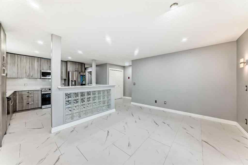 MLS® A2233858 - Unit #102 339 30 Avenue NE in Tuxedo Park Calgary, Residential