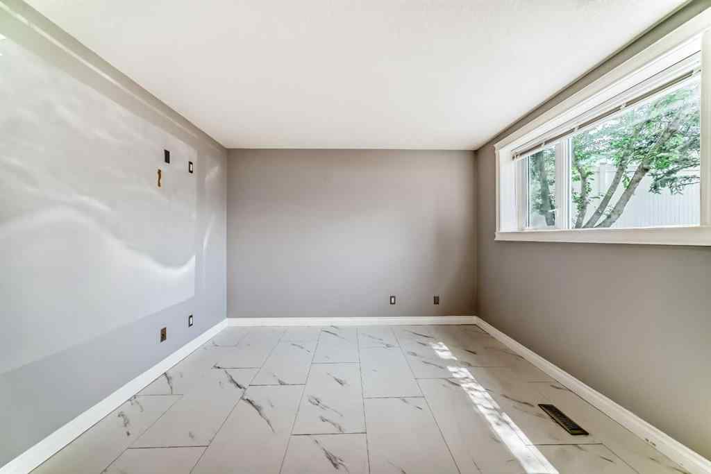 MLS® A2233858 - Unit #102 339 30 Avenue NE in Tuxedo Park Calgary, Residential
