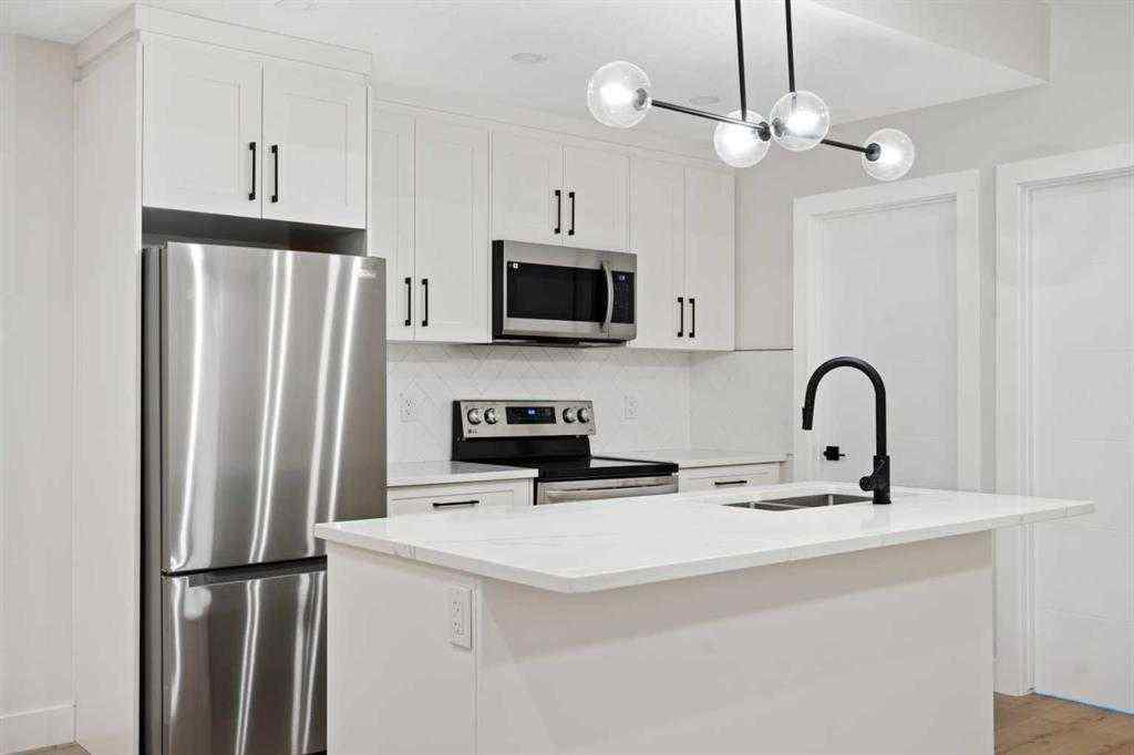 MLS® A2233948 - 2232 1 Avenue NW in West Hillhurst Calgary, Residential