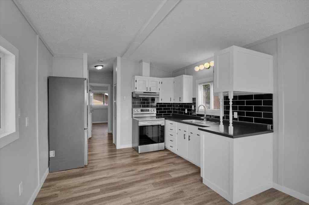 MLS® A2234101 - Unit #27 2106 50 Street SE in Forest Lawn Calgary, Mobile
