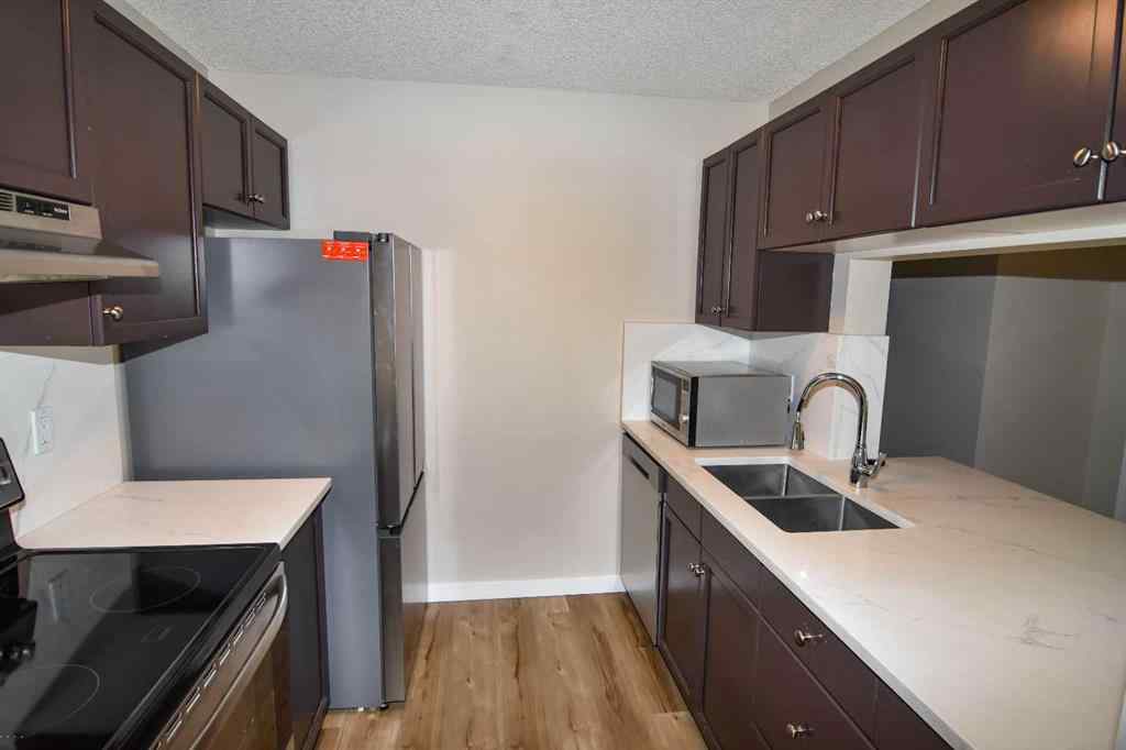 MLS® A2234113 - Unit #109 2022 Canyon Meadows Drive SE in Queensland Calgary, Residential