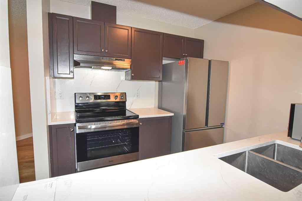 MLS® A2234113 - Unit #109 2022 Canyon Meadows Drive SE in Queensland Calgary, Residential