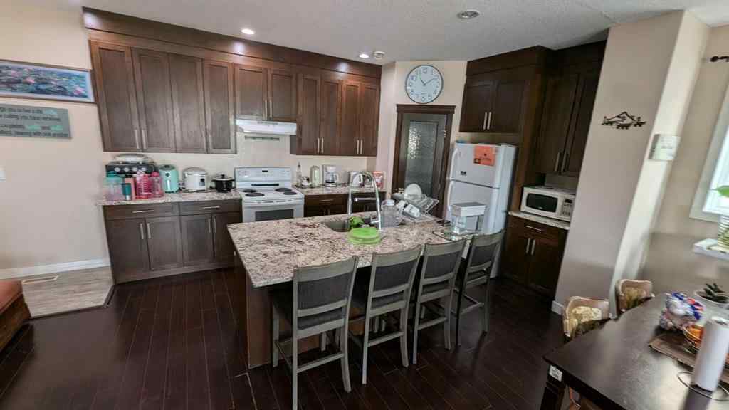 MLS® A2234165 - 7013 50 Avenue  in Cascades Camrose, Residential