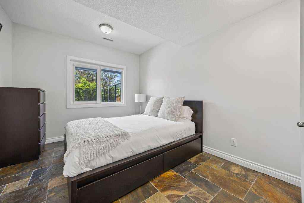 MLS® A2234195 - 230 Bow Ridge Court  in Bow Ridge Cochrane, Residential