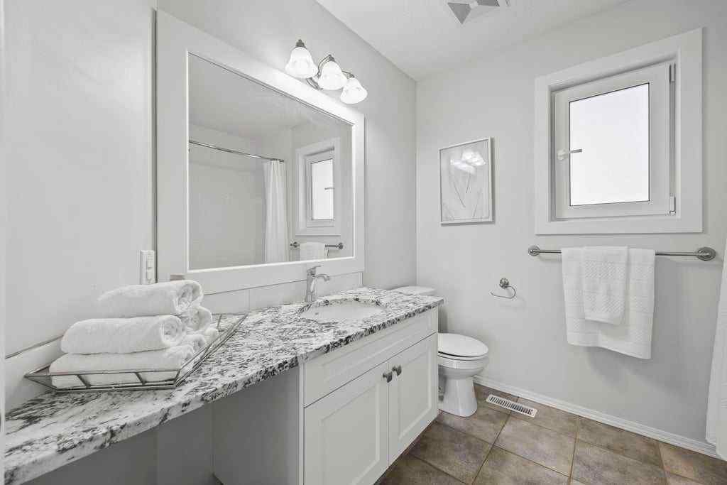 MLS® A2234195 - 230 Bow Ridge Court  in Bow Ridge Cochrane, Residential