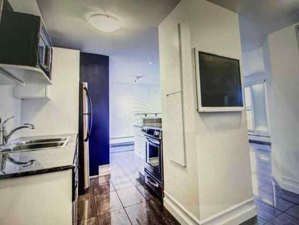 MLS® A2234256 - Unit #704 706 15 Avenue SW in Beltline Calgary, Residential