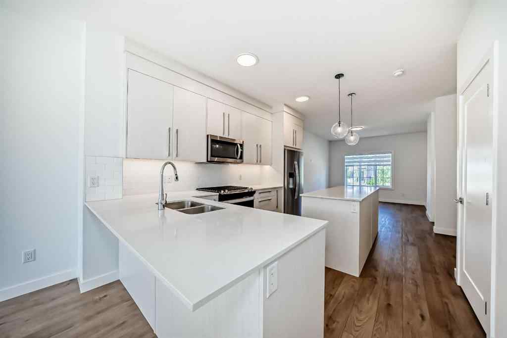 MLS® A2234295 - 7403 202 Avenue SE in Rangeview Calgary, Residential