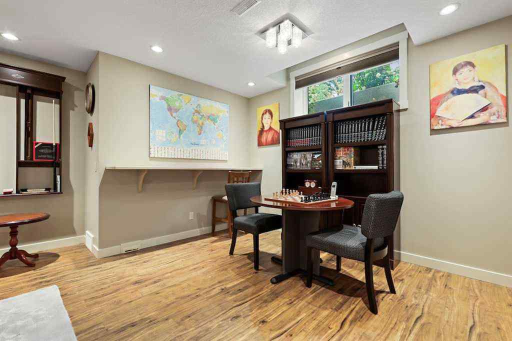 MLS® A2234328 - 215 Patton Court SW in Pump Hill Calgary, Residential