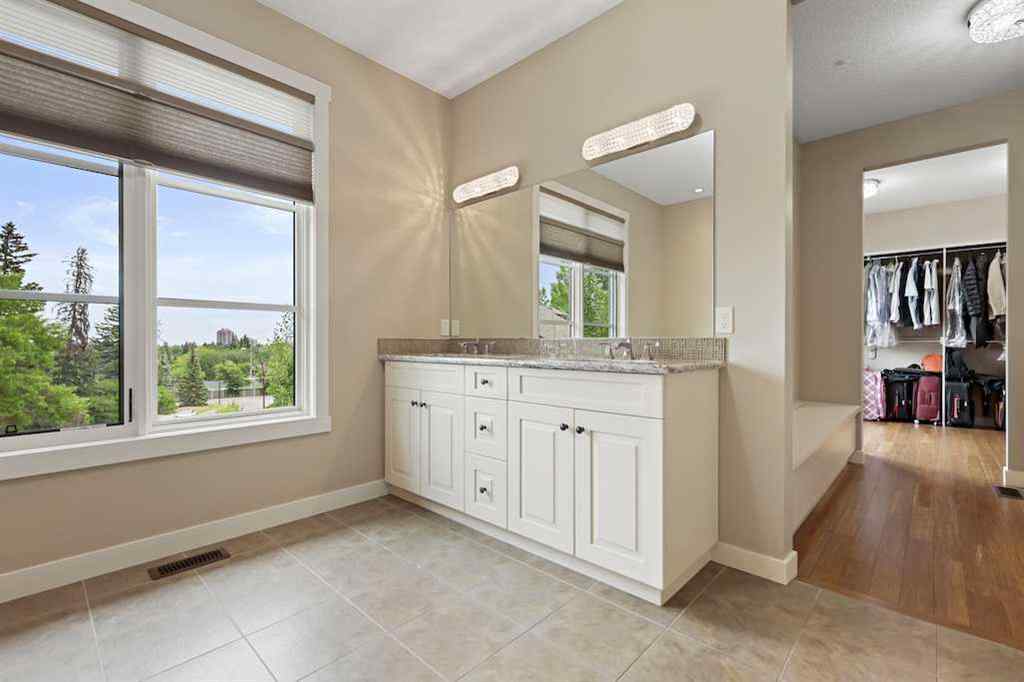 MLS® A2234328 - 215 Patton Court SW in Pump Hill Calgary, Residential