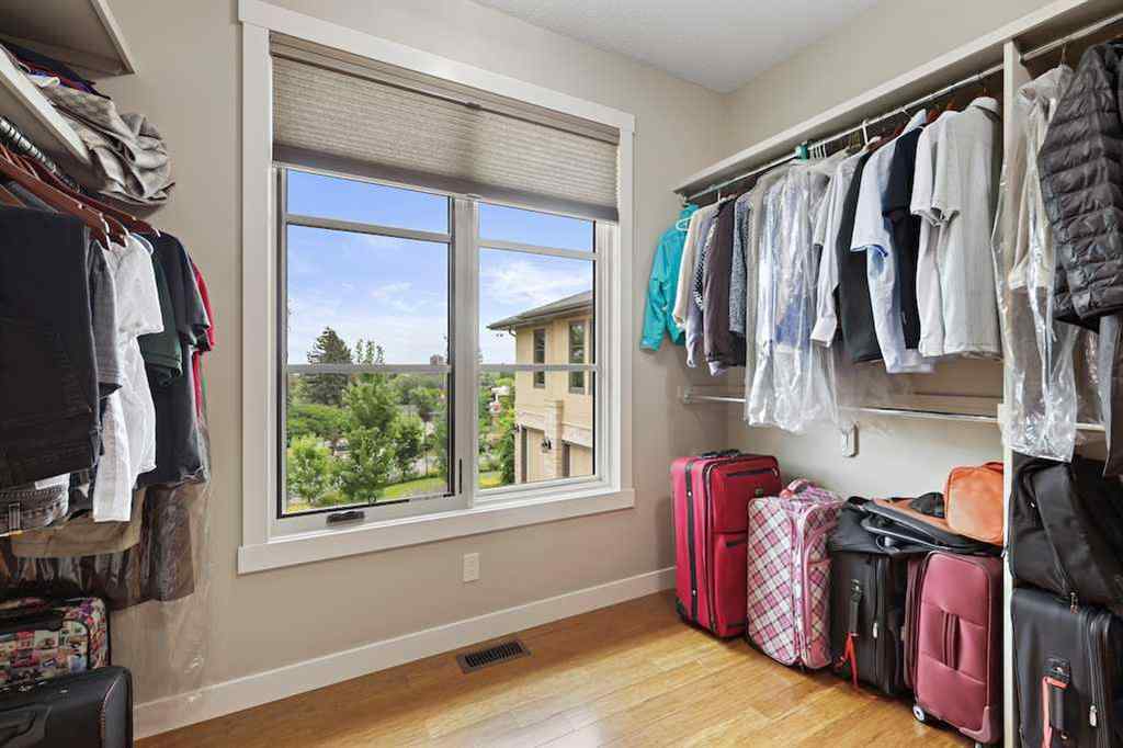 MLS® A2234328 - 215 Patton Court SW in Pump Hill Calgary, Residential