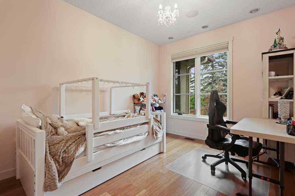 MLS® A2234328 - 215 Patton Court SW in Pump Hill Calgary, Residential