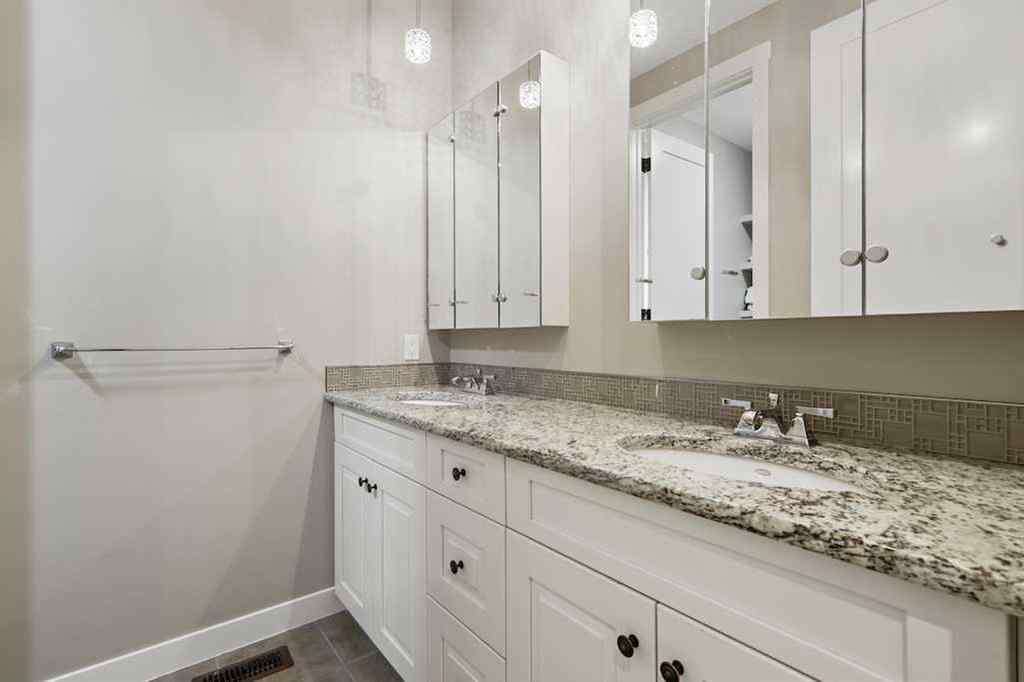 MLS® A2234328 - 215 Patton Court SW in Pump Hill Calgary, Residential