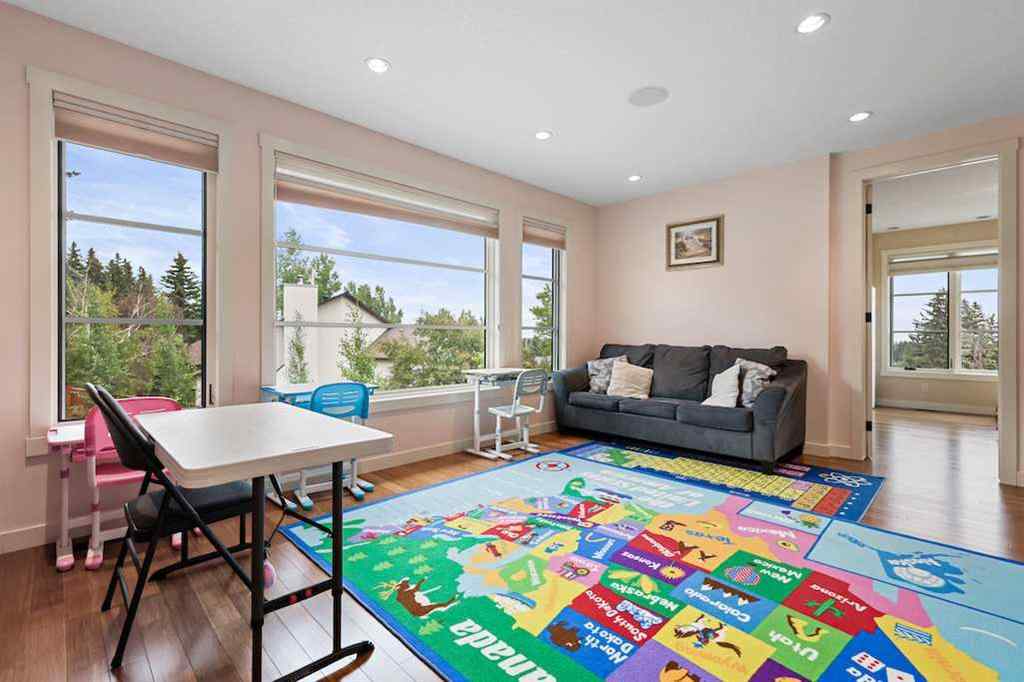 MLS® A2234328 - 215 Patton Court SW in Pump Hill Calgary, Residential