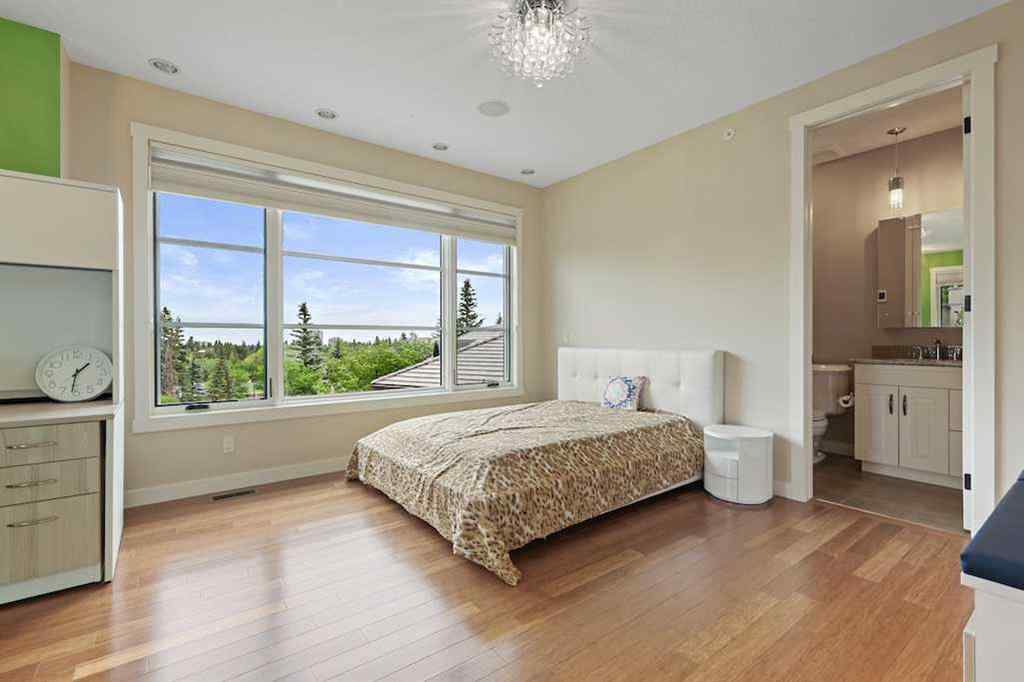 MLS® A2234328 - 215 Patton Court SW in Pump Hill Calgary, Residential