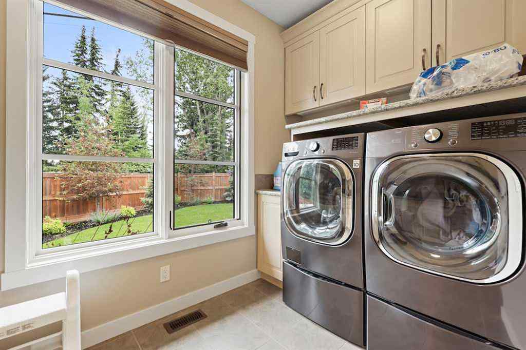 MLS® A2234328 - 215 Patton Court SW in Pump Hill Calgary, Residential