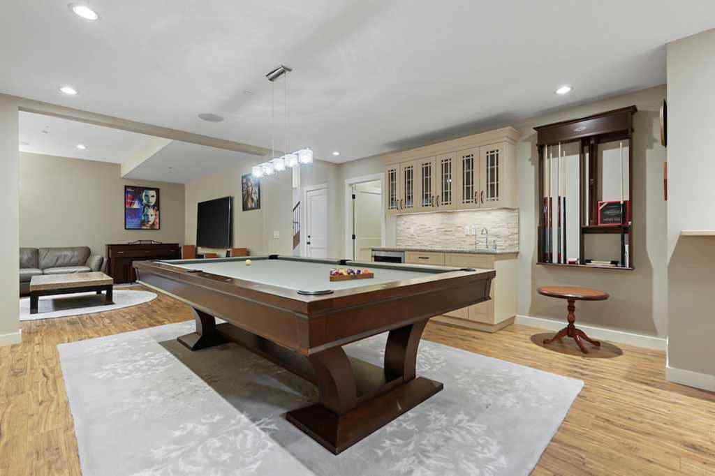 MLS® A2234328 - 215 Patton Court SW in Pump Hill Calgary, Residential