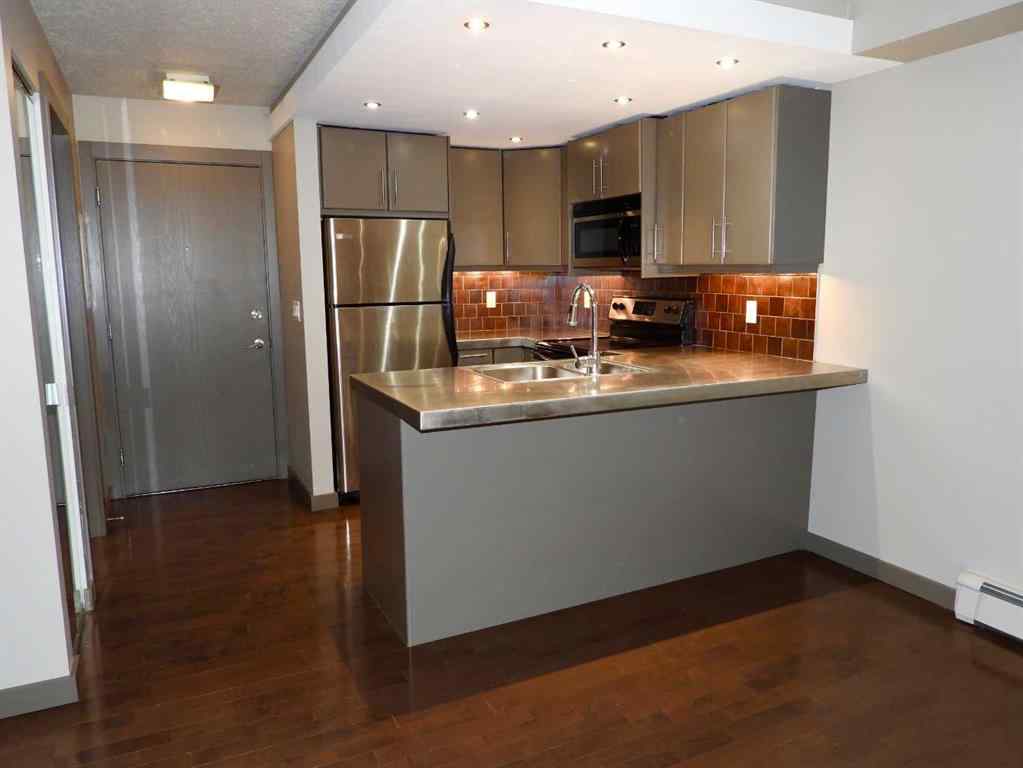 MLS® A2234346 - Unit #104 2411 29 Street SW in Killarney/Glengarry Calgary, Residential