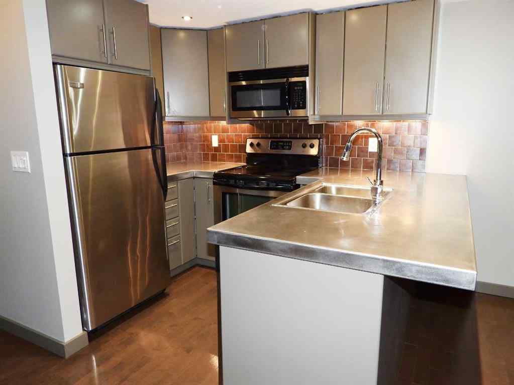 MLS® A2234346 - Unit #104 2411 29 Street SW in Killarney/Glengarry Calgary, Residential