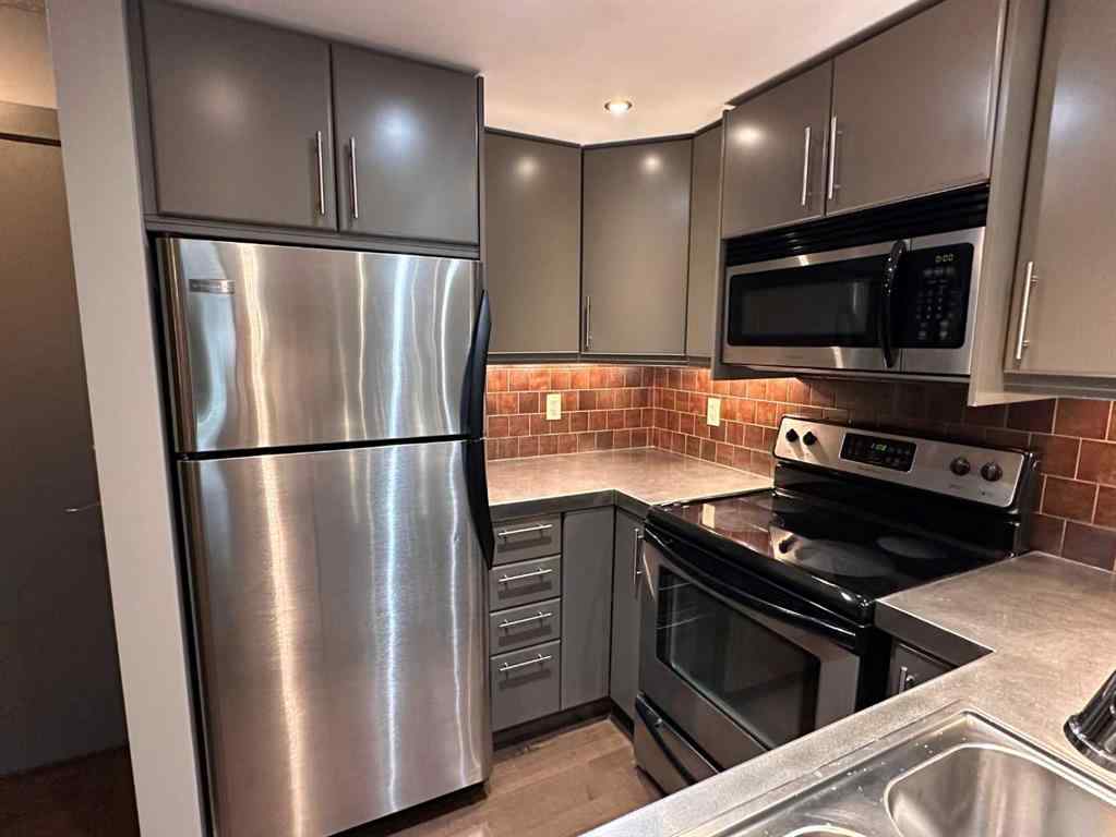 MLS® A2234346 - Unit #104 2411 29 Street SW in Killarney/Glengarry Calgary, Residential