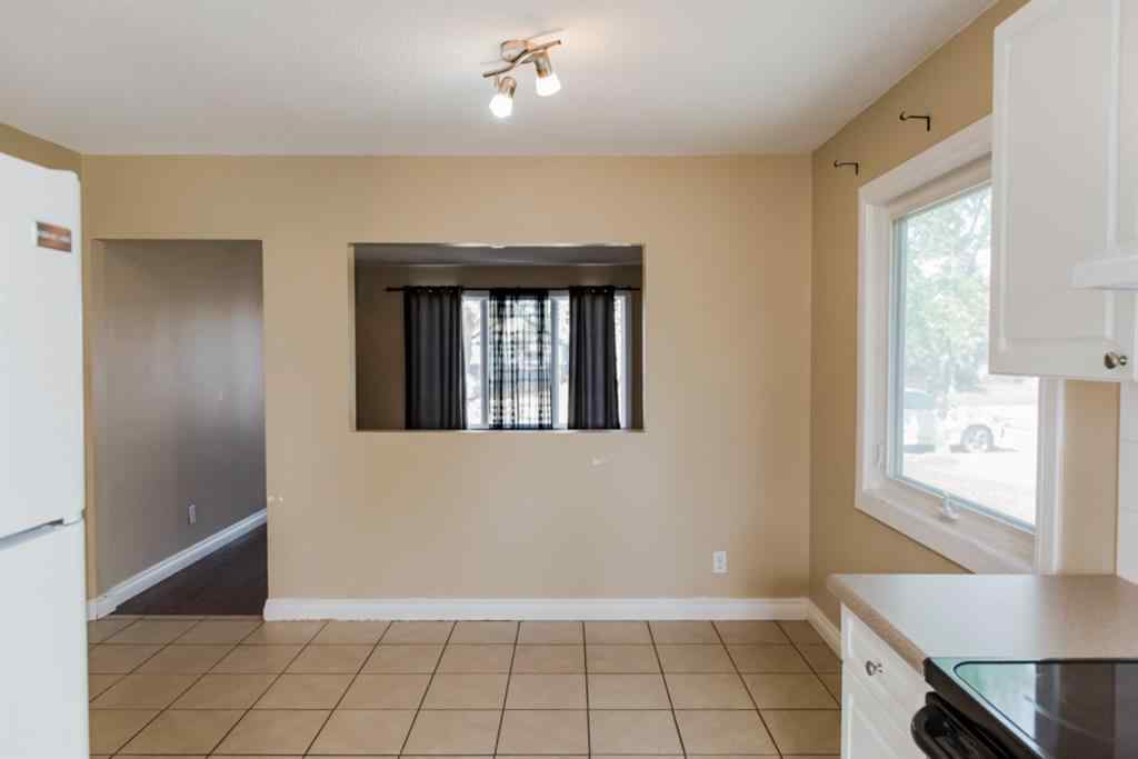 MLS® A2234424 - 10019 93 Avenue  in Swanavon Grande Prairie, Residential