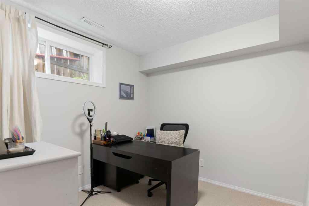 MLS® A2234459 - 117 Tuscany Ridge Mews NW in Tuscany Calgary, Residential