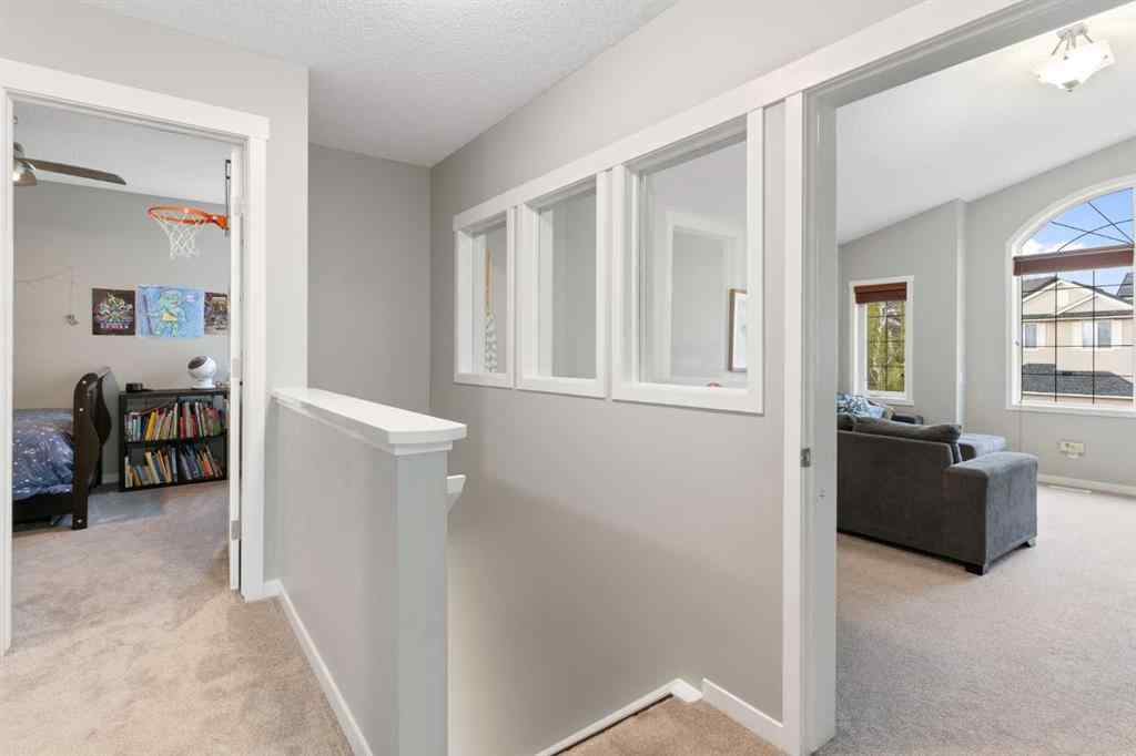 MLS® A2234459 - 117 Tuscany Ridge Mews NW in Tuscany Calgary, Residential