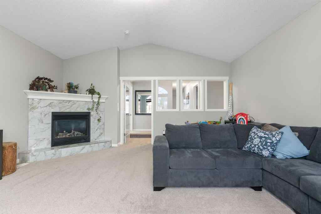 MLS® A2234459 - 117 Tuscany Ridge Mews NW in Tuscany Calgary, Residential