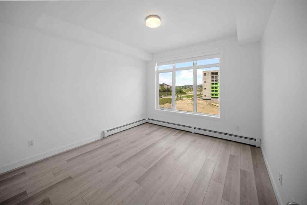 MLS® A2234475 - Unit #403 205 Spring Creek Common SW in Springbank Hill Calgary, Residential