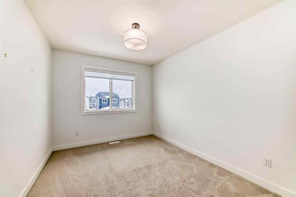 MLS® A2234581 - 106 Dawson Harbour Grove  in Dawson\'s Landing Chestermere, Residential