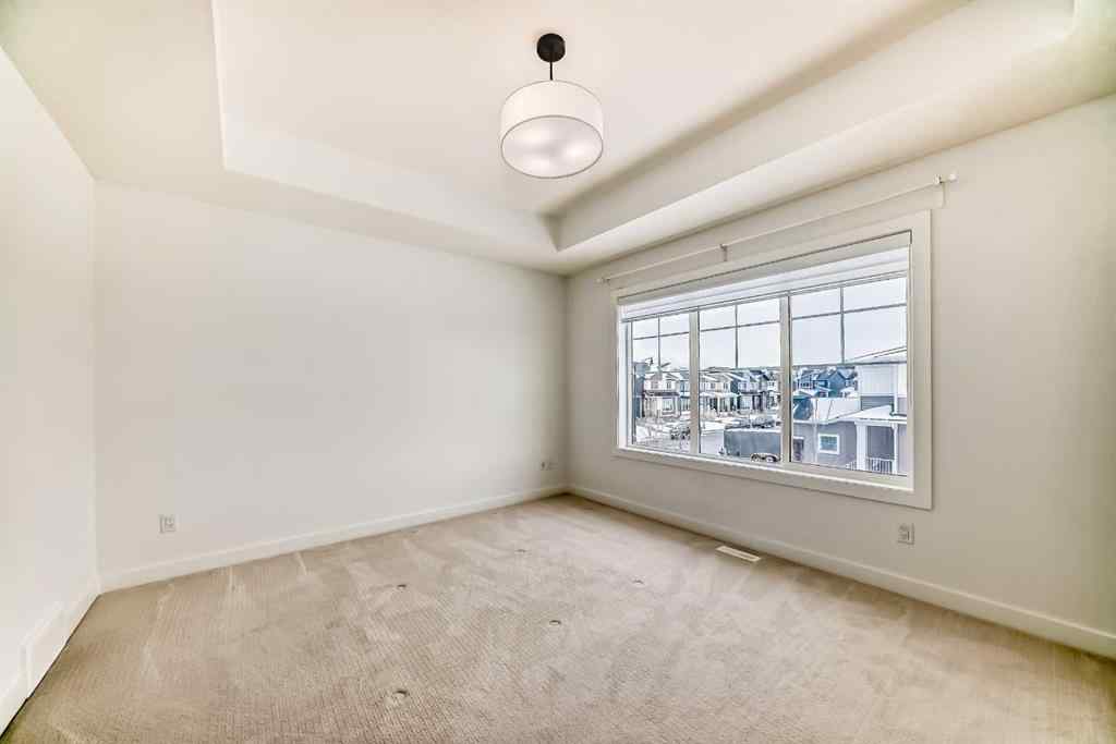 MLS® A2234581 - 106 Dawson Harbour Grove  in Dawson\'s Landing Chestermere, Residential