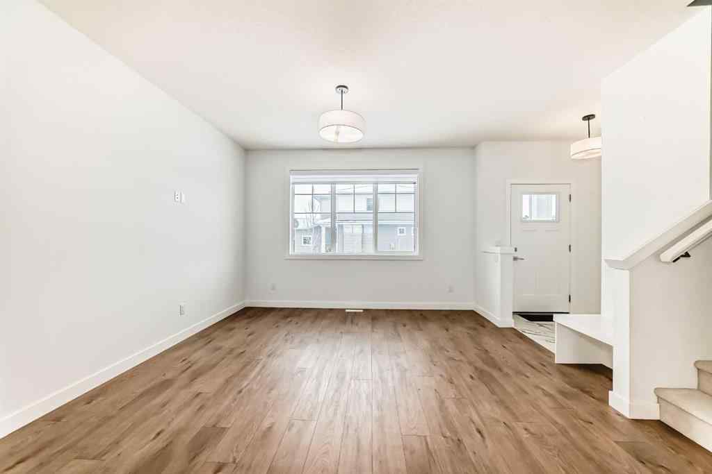 MLS® A2234581 - 106 Dawson Harbour Grove  in Dawson\'s Landing Chestermere, Residential