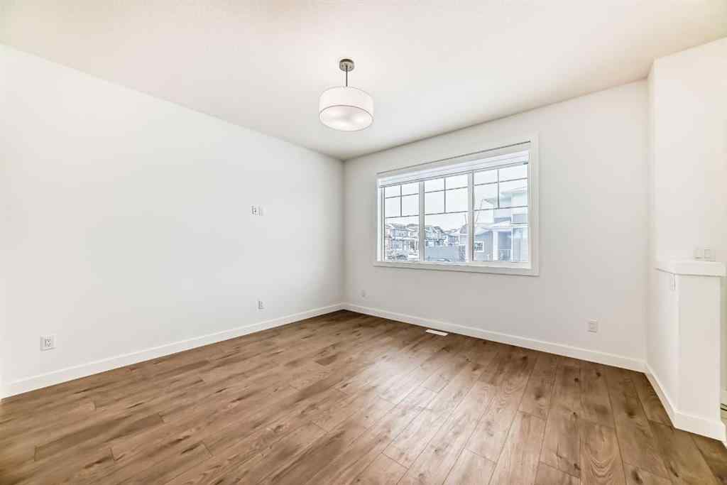 MLS® A2234581 - 106 Dawson Harbour Grove  in Dawson\'s Landing Chestermere, Residential