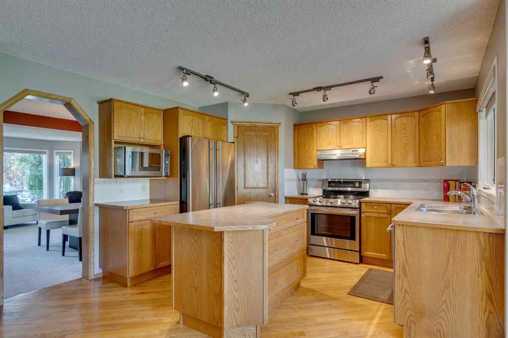MLS® A2234606 - 210 Sienna Park Court SW in Signal Hill Calgary, Residential