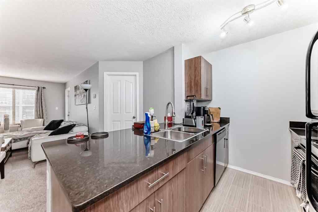 MLS® A2234686 - Unit #1305 403 Mackenzie Way SW in Downtown Airdrie, Residential