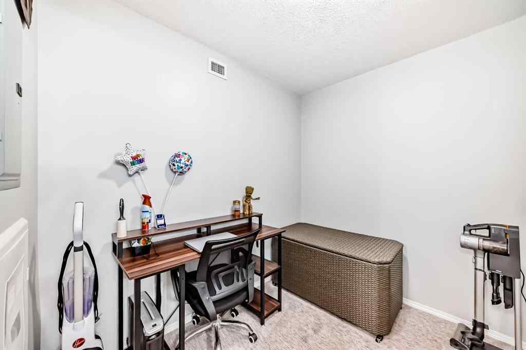 MLS® A2234686 - Unit #1305 403 Mackenzie Way SW in Downtown Airdrie, Residential