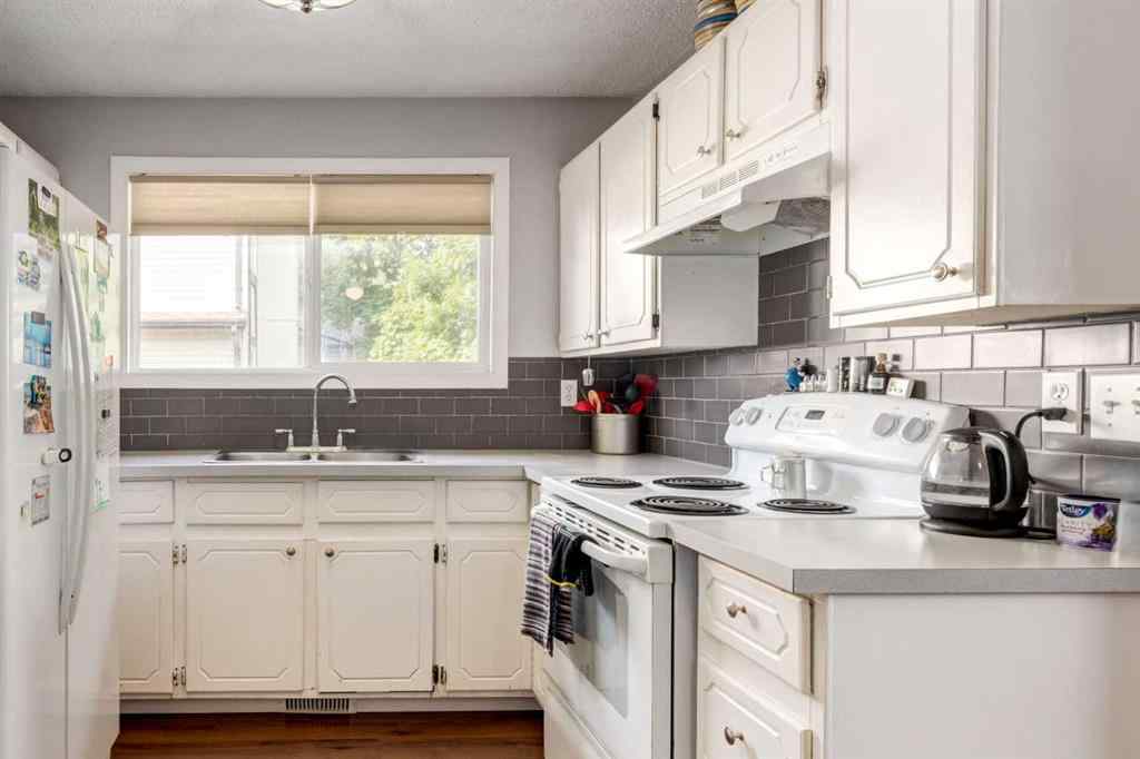 MLS® A2234690 - 212 Deerview Court SE in Deer Ridge Calgary, Residential
