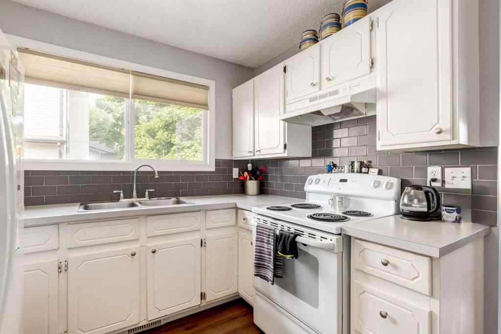 MLS® A2234690 - 212 Deerview Court SE in Deer Ridge Calgary, Residential