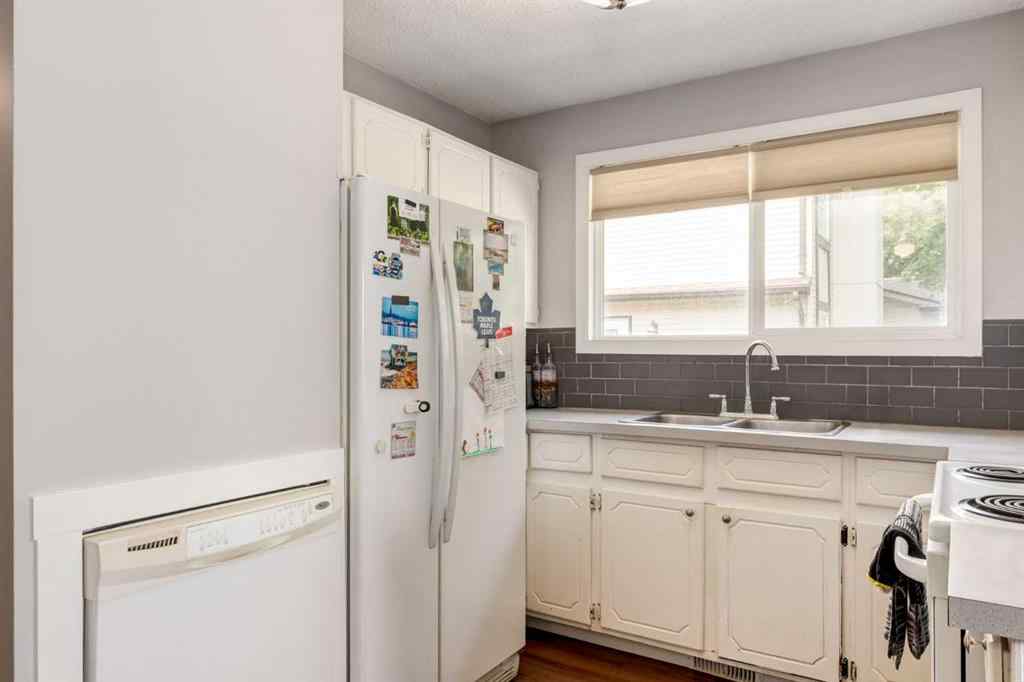 MLS® A2234690 - 212 Deerview Court SE in Deer Ridge Calgary, Residential