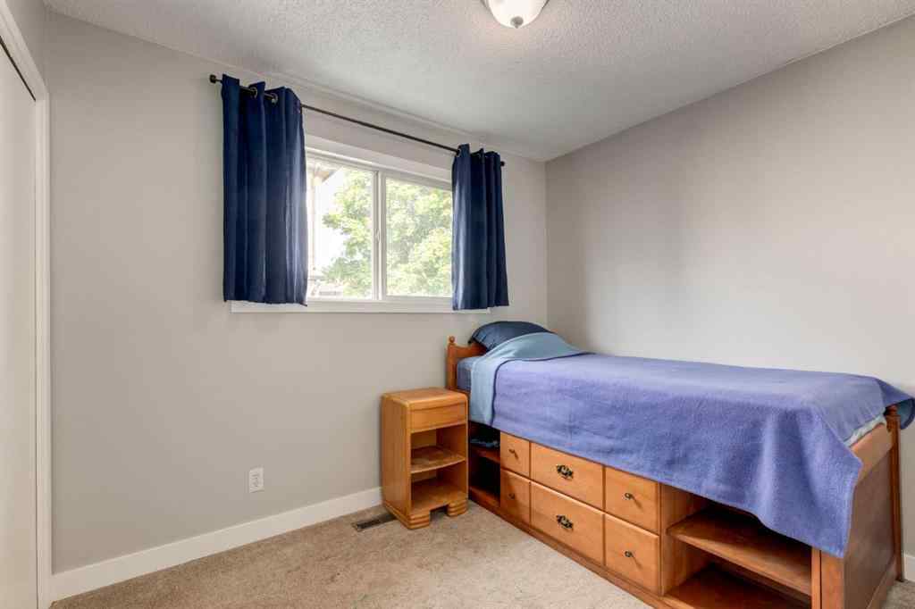 MLS® A2234690 - 212 Deerview Court SE in Deer Ridge Calgary, Residential