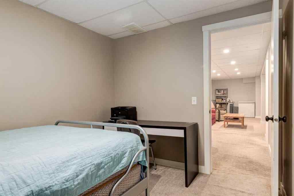 MLS® A2234690 - 212 Deerview Court SE in Deer Ridge Calgary, Residential