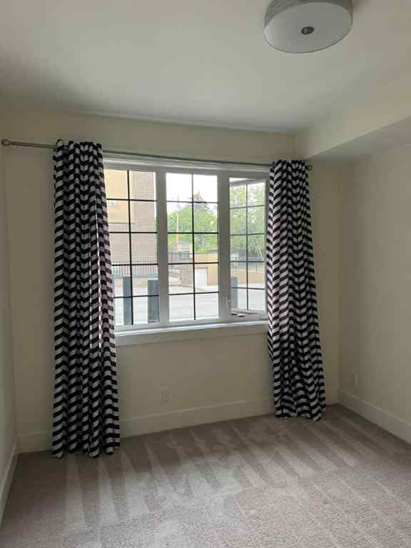 MLS® A2234694 - Unit #105 3320 3 Avenue NW in Parkdale Calgary, Residential