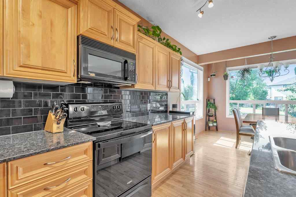 MLS® A2234754 - 116 Seagreen Link  in Rainbow Falls Chestermere, Residential