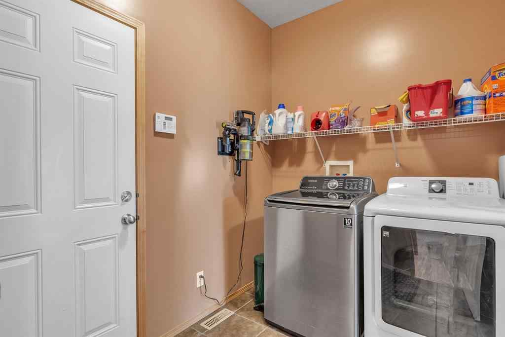 MLS® A2234754 - 116 Seagreen Link  in Rainbow Falls Chestermere, Residential