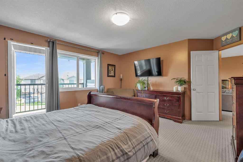 MLS® A2234754 - 116 Seagreen Link  in Rainbow Falls Chestermere, Residential