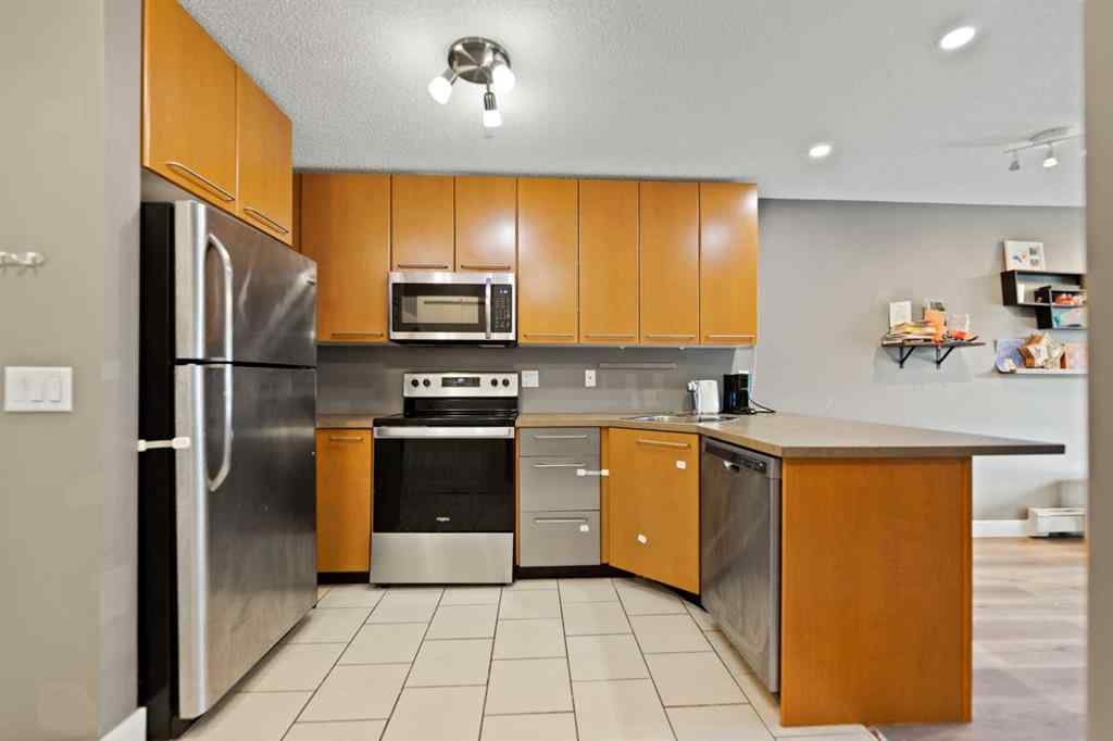 MLS® A2234817 - Unit #202 35 Richard Court SW in Lincoln Park Calgary, Residential