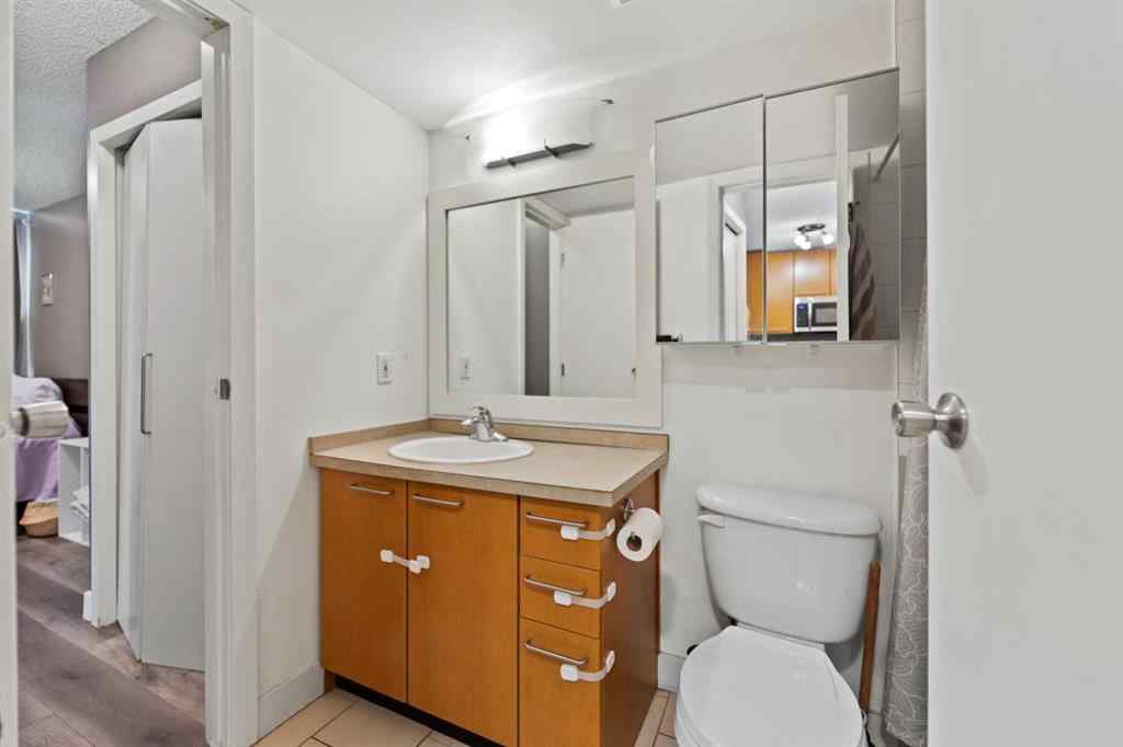 MLS® A2234817 - Unit #202 35 Richard Court SW in Lincoln Park Calgary, Residential