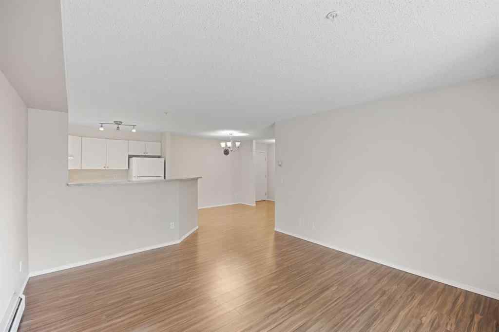 MLS® A2234885 - Unit #115 4000 Somervale Court SW in Somerset Calgary, Residential